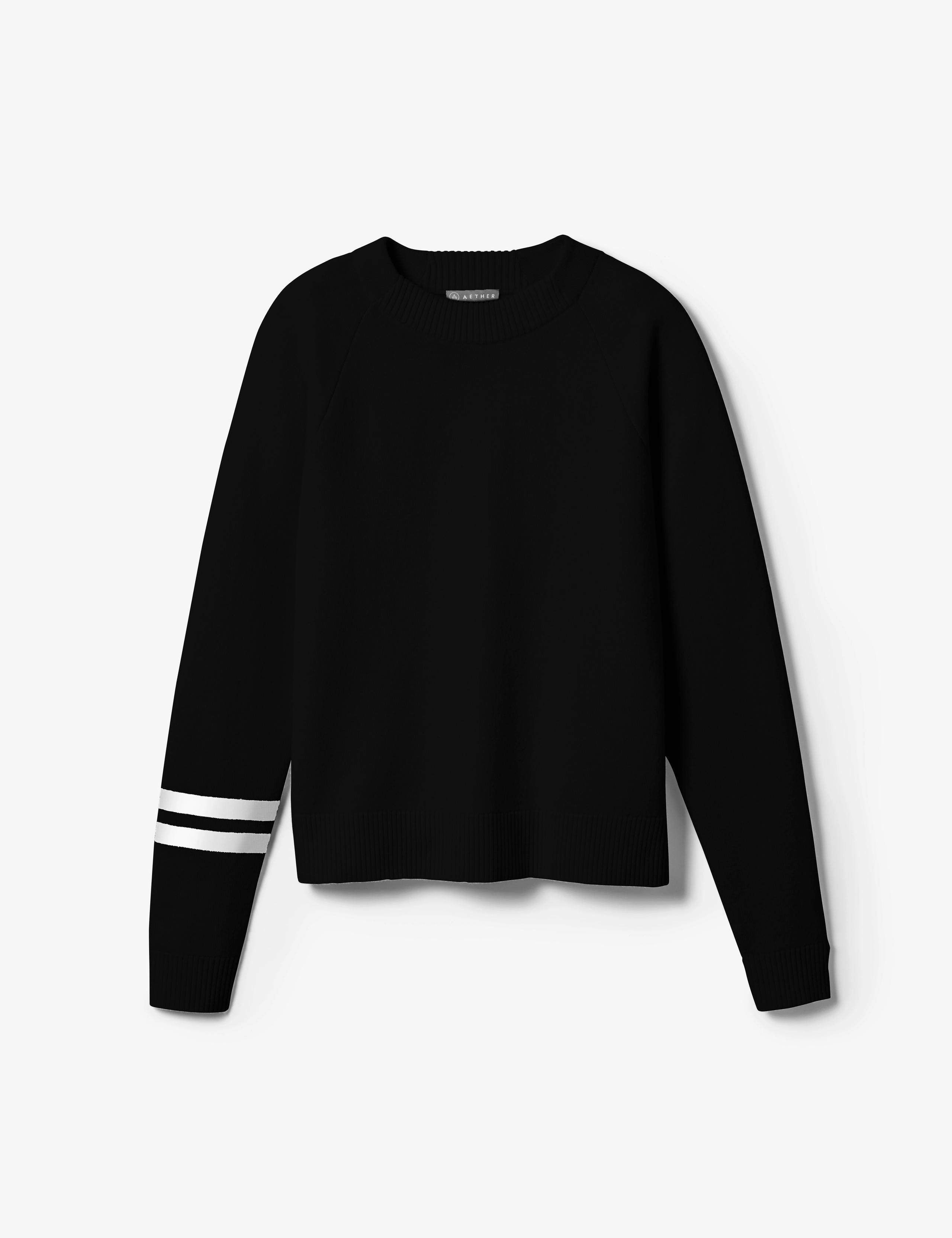 Studio laydown of Racer Sweater 2.0 in Onyx Black
