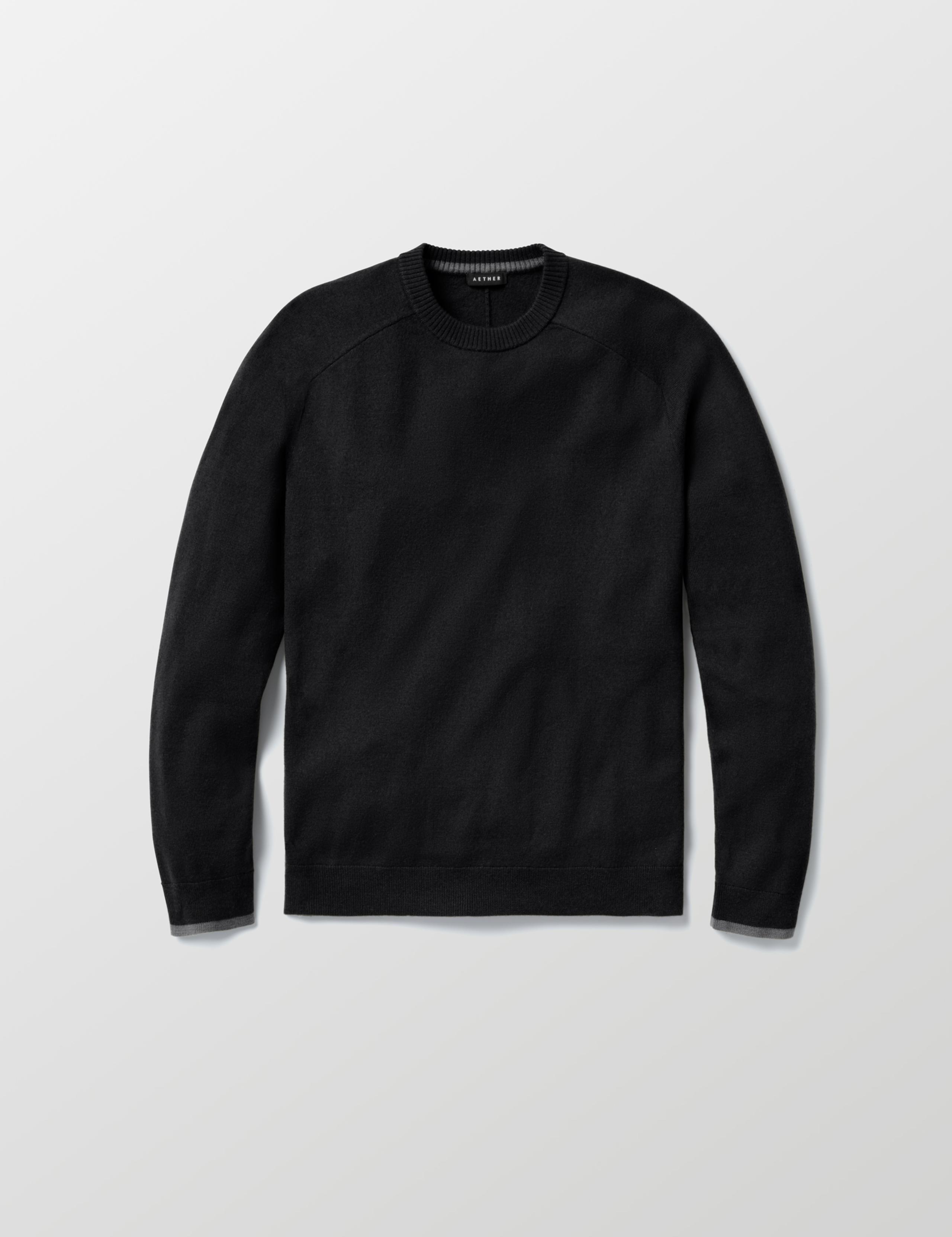 Studio laydown of Corbin Sweater in Onyx Black