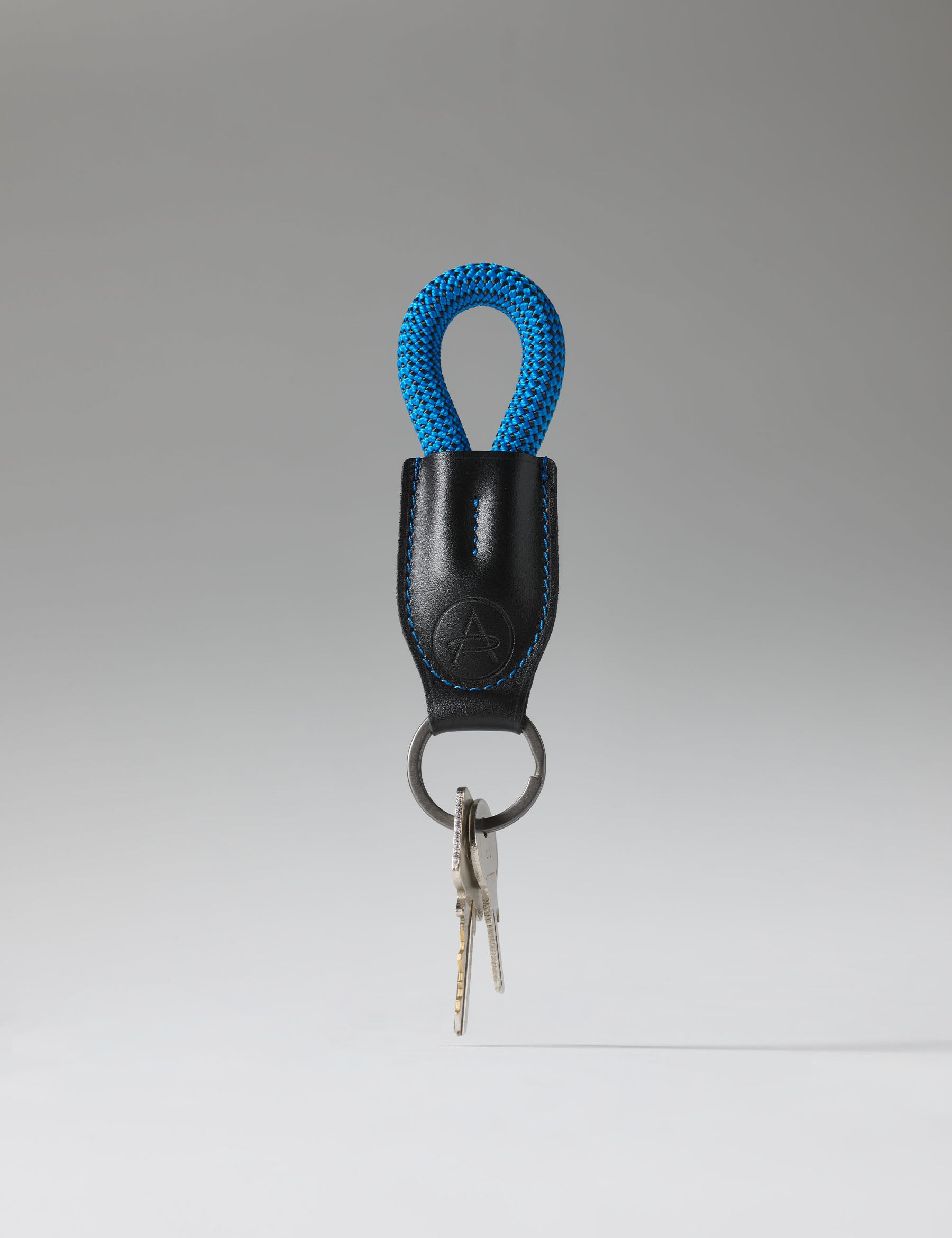 Studio image of AETHER Rope Keychain with keys.