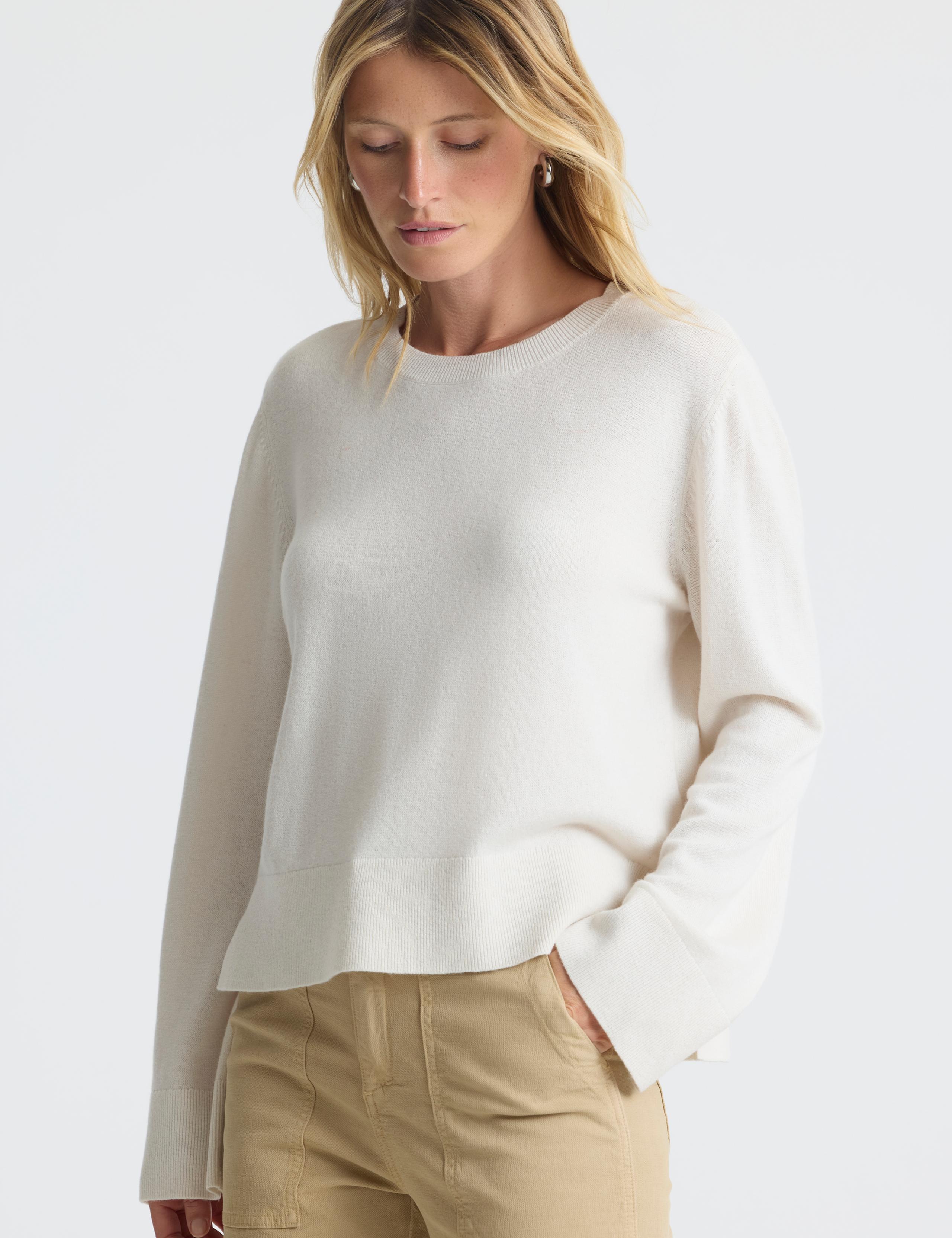 Woman wearing Leigh Crewneck Sweater in Winter White