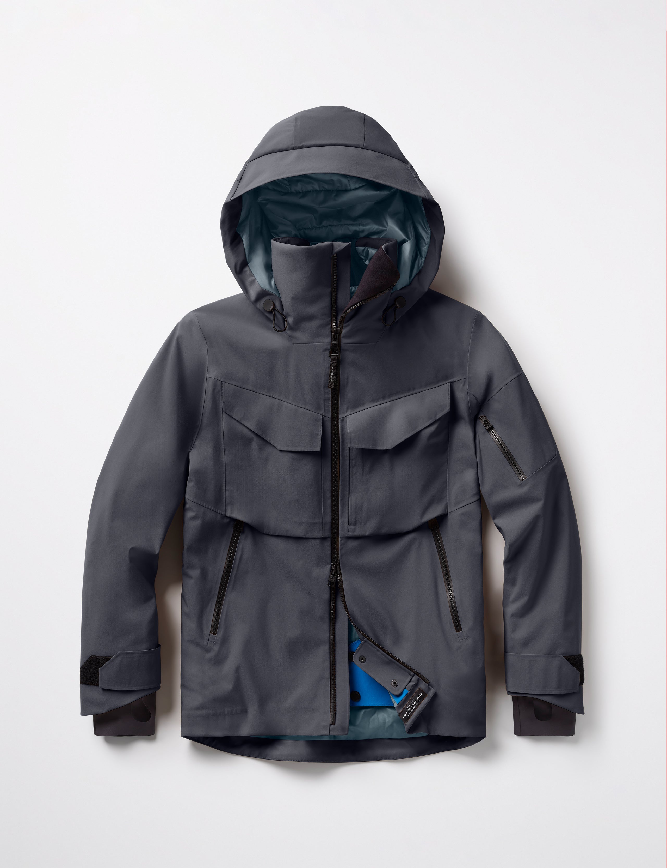 Flat lay of Brighton Insulated Snow Jacket in Graphite from AETHER Apparel.