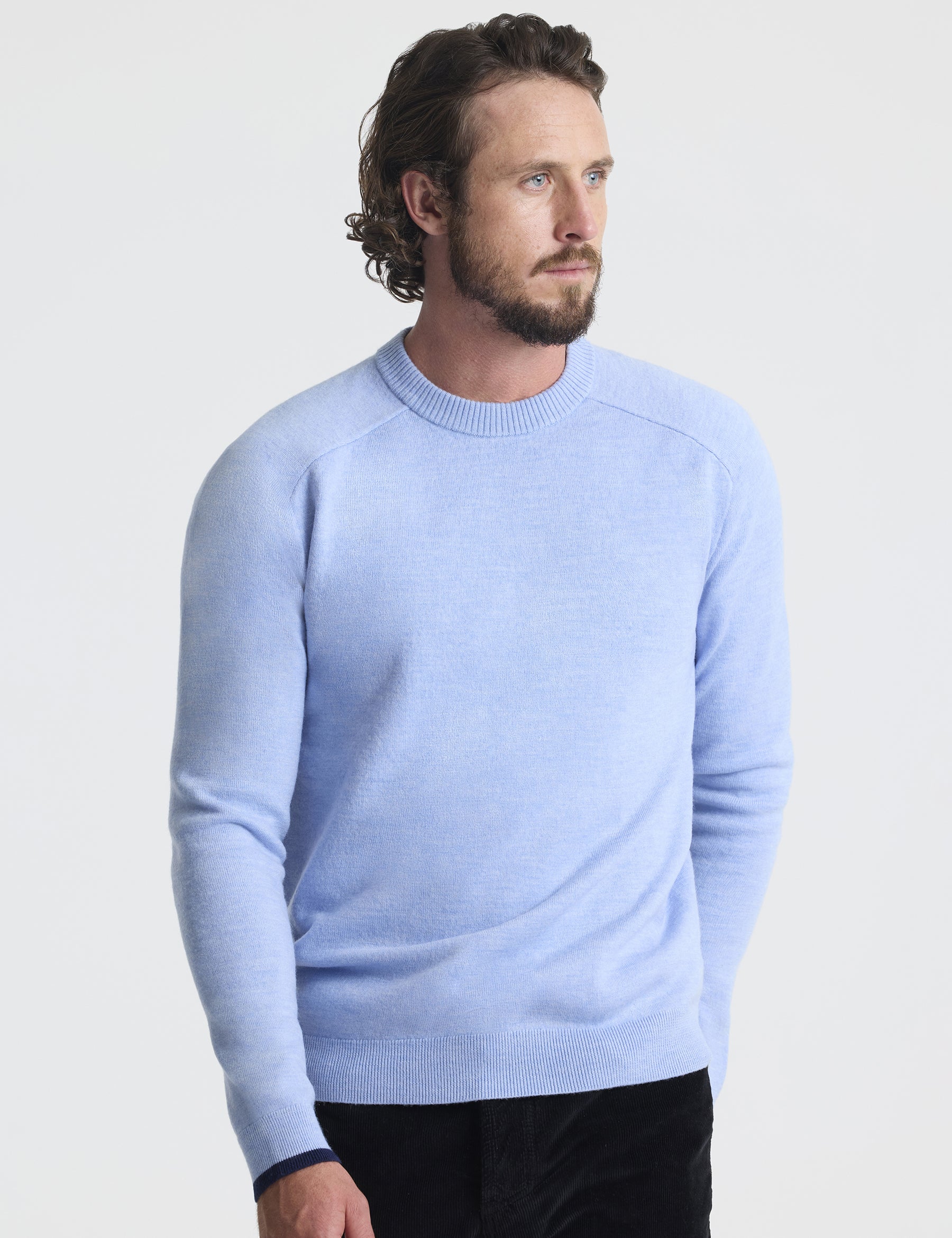 Front view of man wearing Corbin Sweater in Light Blue Heather from AETHER Apparel.