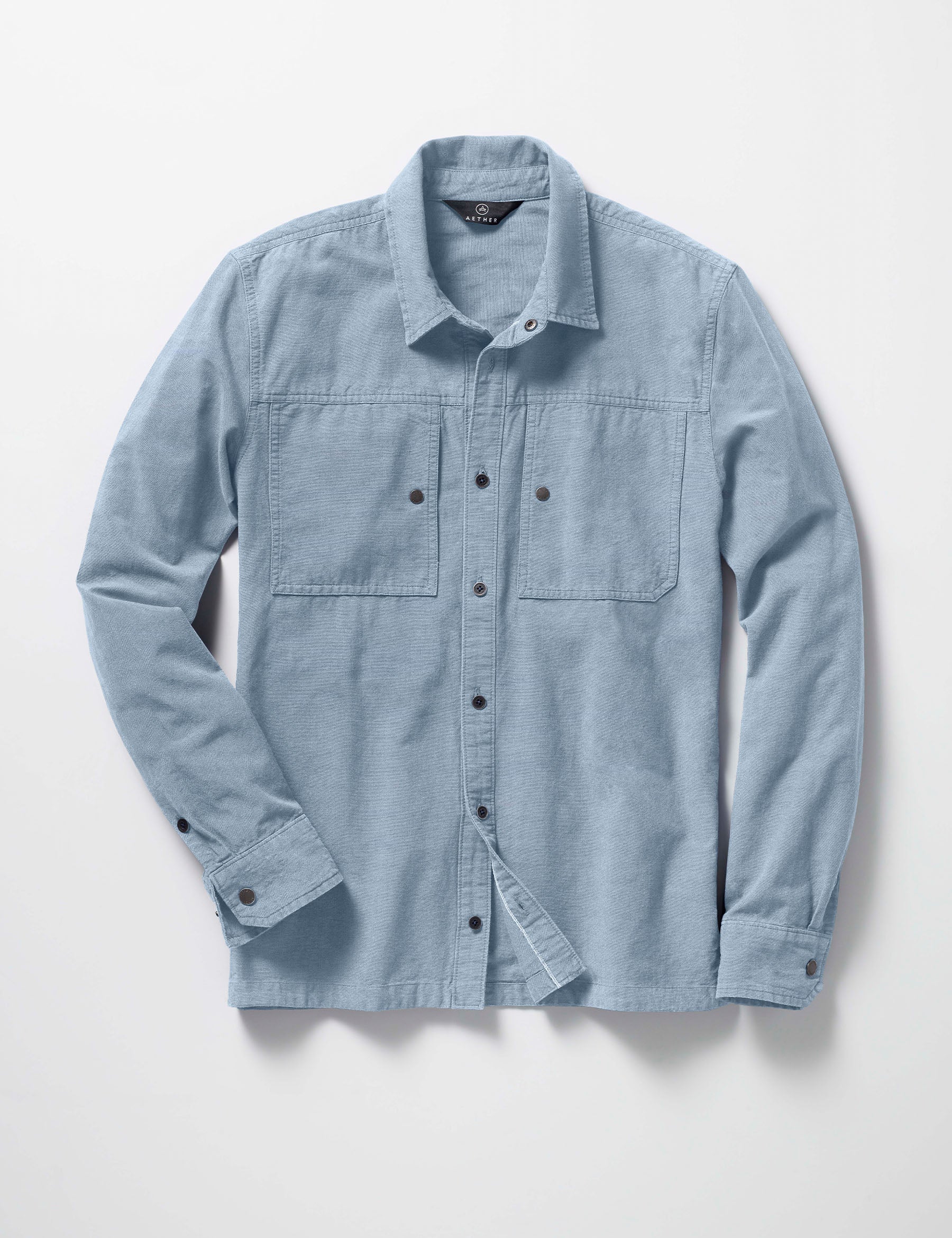 Flay lay of the Emerson Button Down in Light Blue from AETHER Apparel.