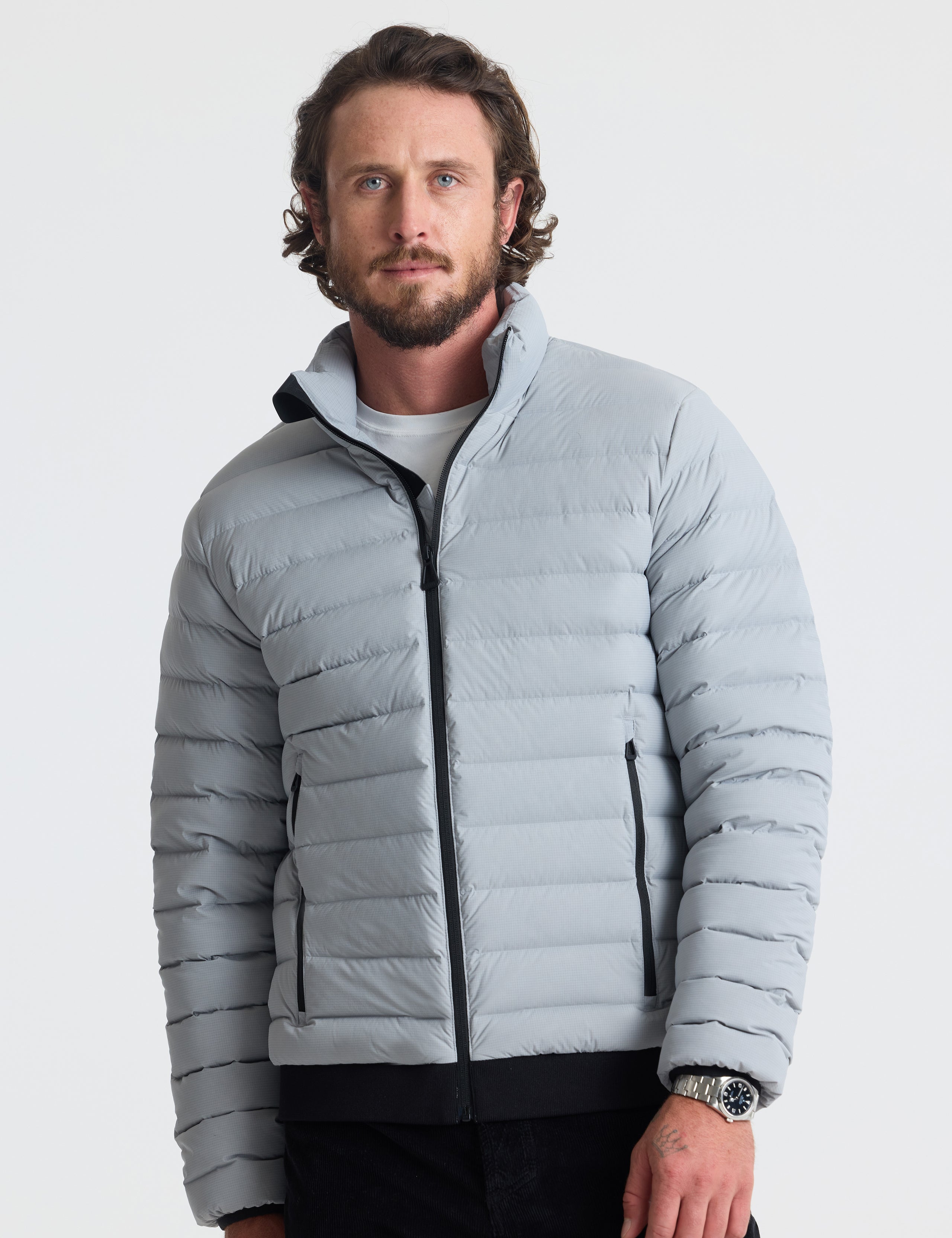 Front view of man wearing Launch Jacket in Sky Grey from AETHER Apparel.