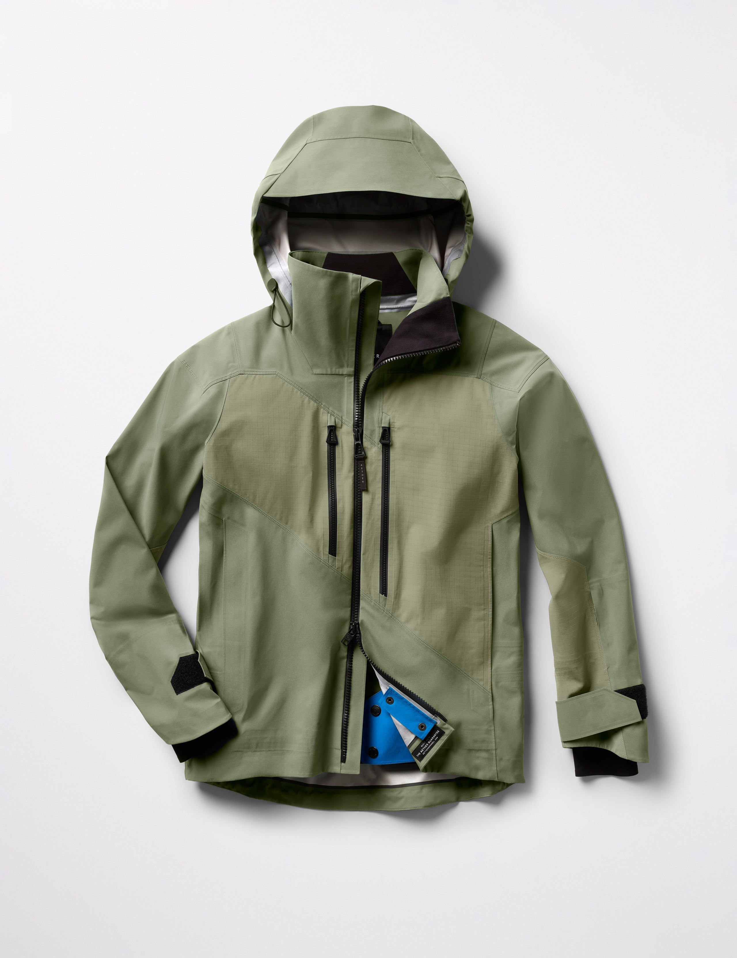 Flat lay of Maverick Snow-Shell Jacket in Fern Green from AETHER Apparel.
