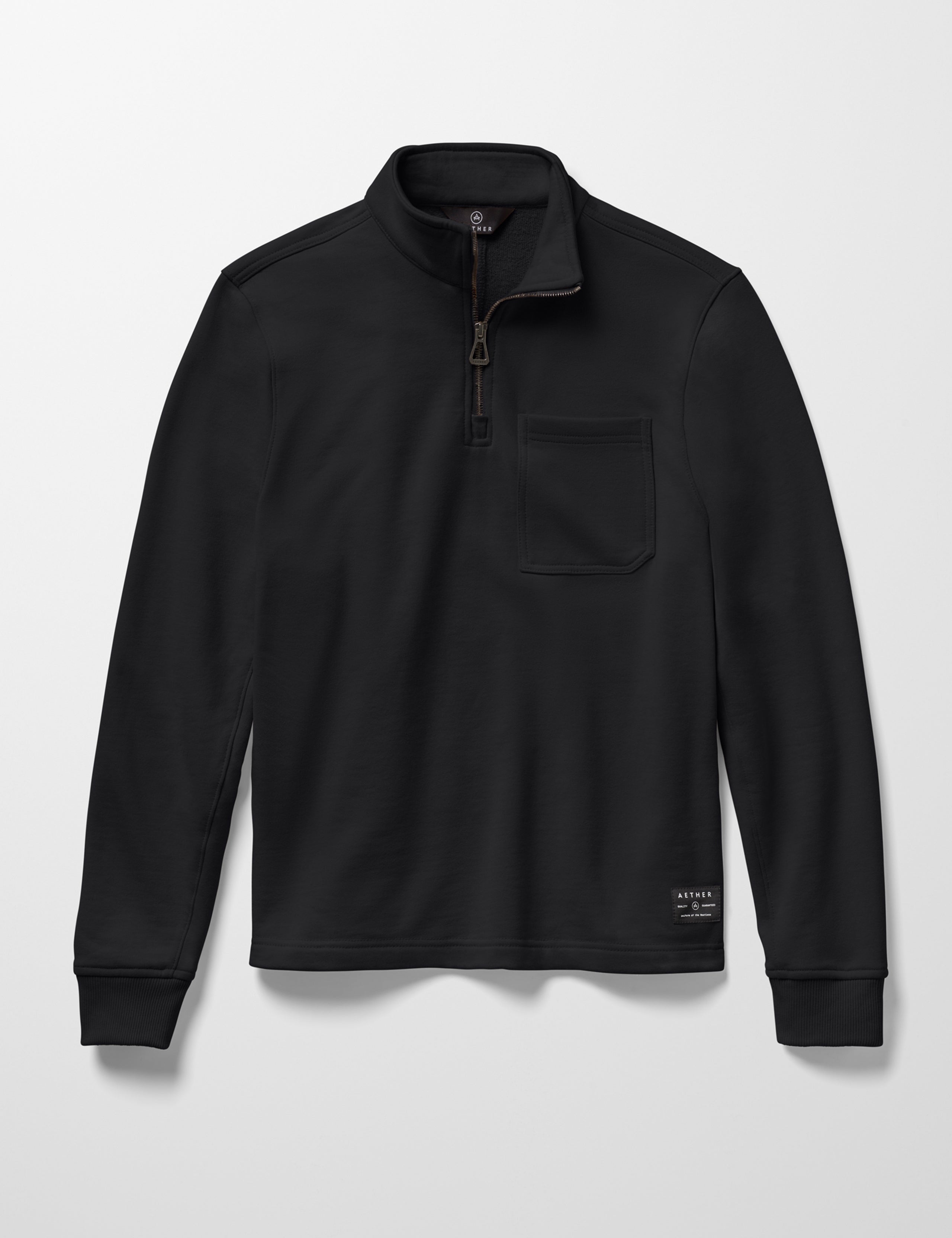 Flat lay image of men's Monte Half-Zip Sweatshirt in Onyx Black from AETHER Apparel.