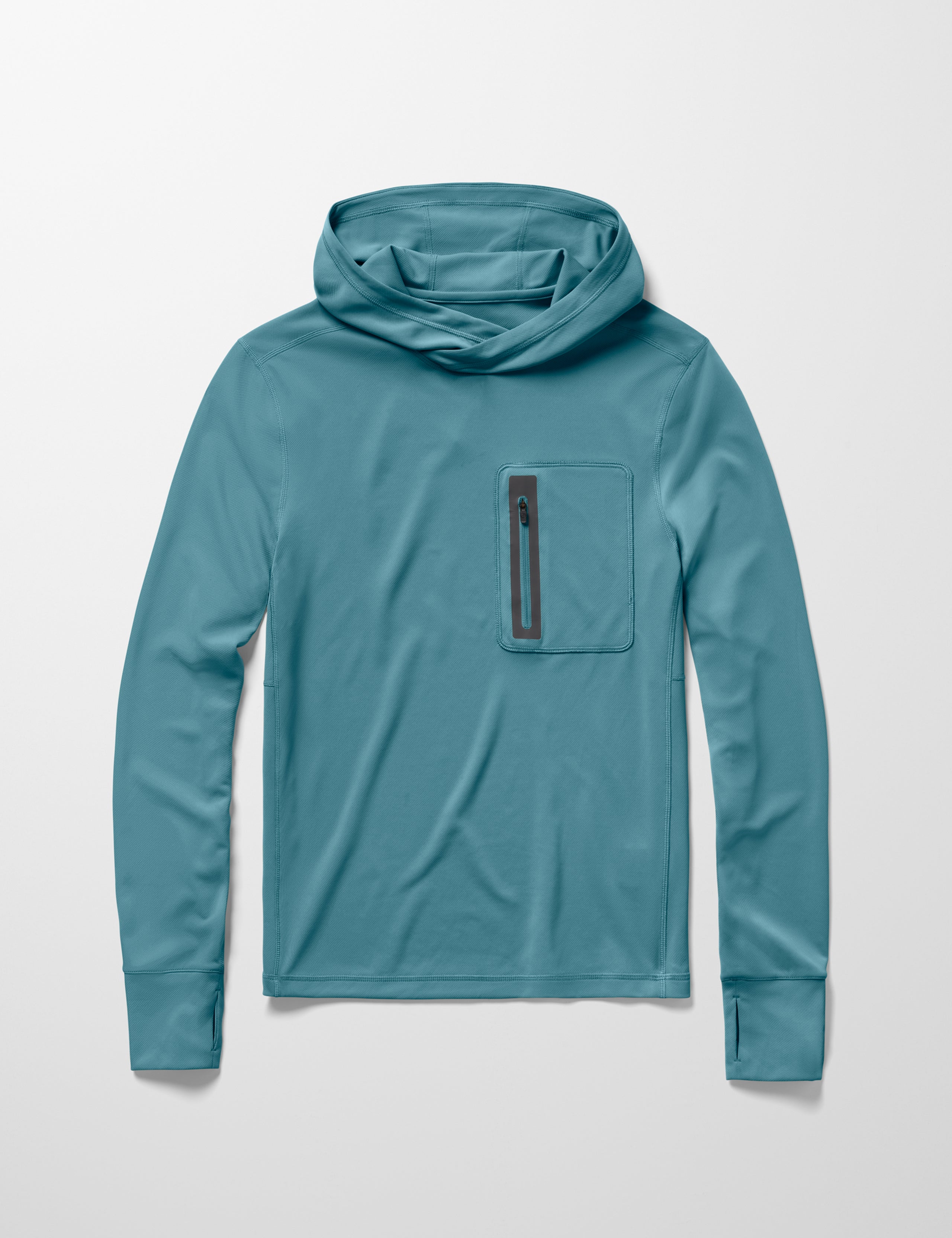 Flay lay image of men’s Pacific Hooded Sun Shirt in Aqua Blue from AETHER Apparel.