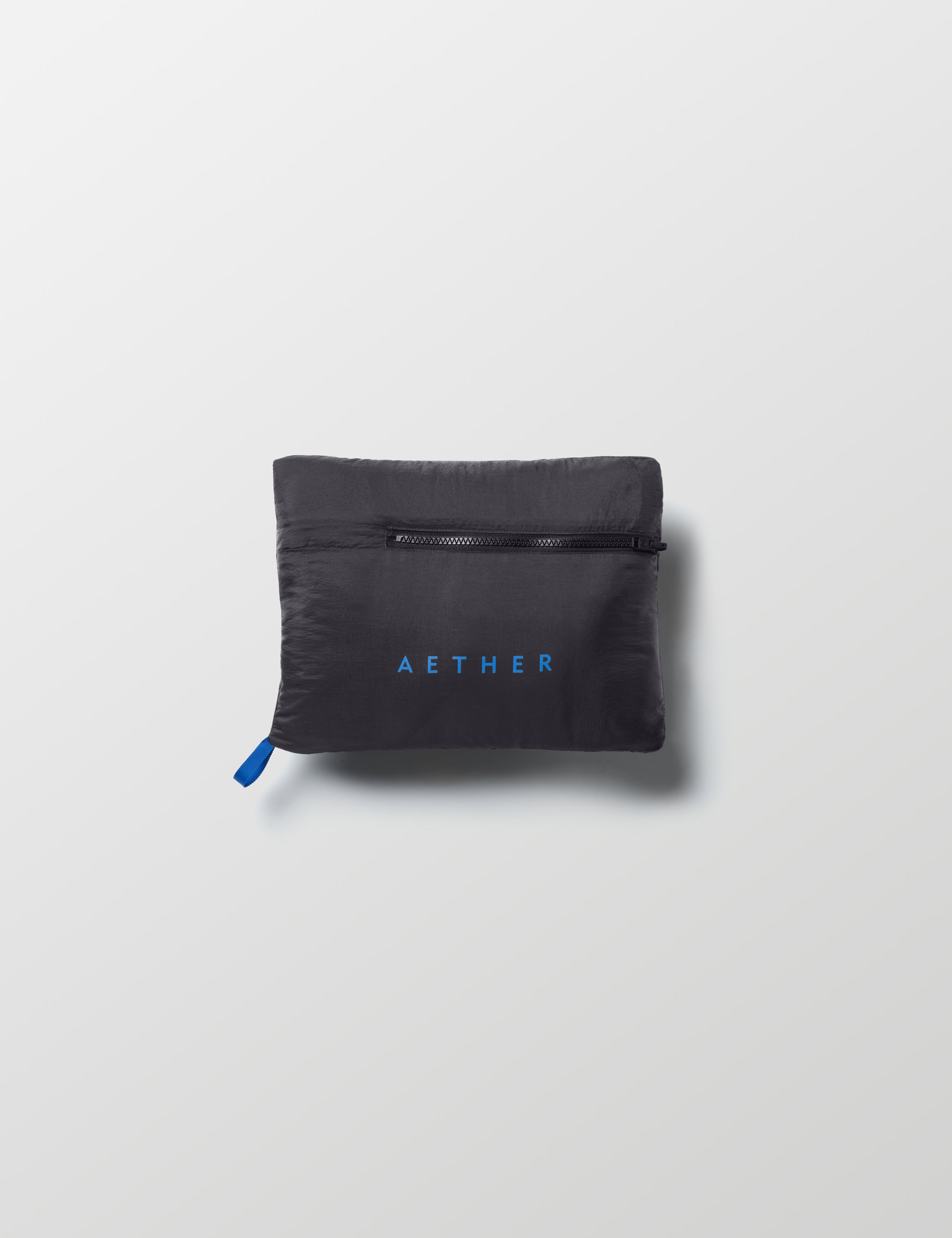 Self-packed Prospect Packable Down Jacket in Onyx Black from AETHER Apparel.