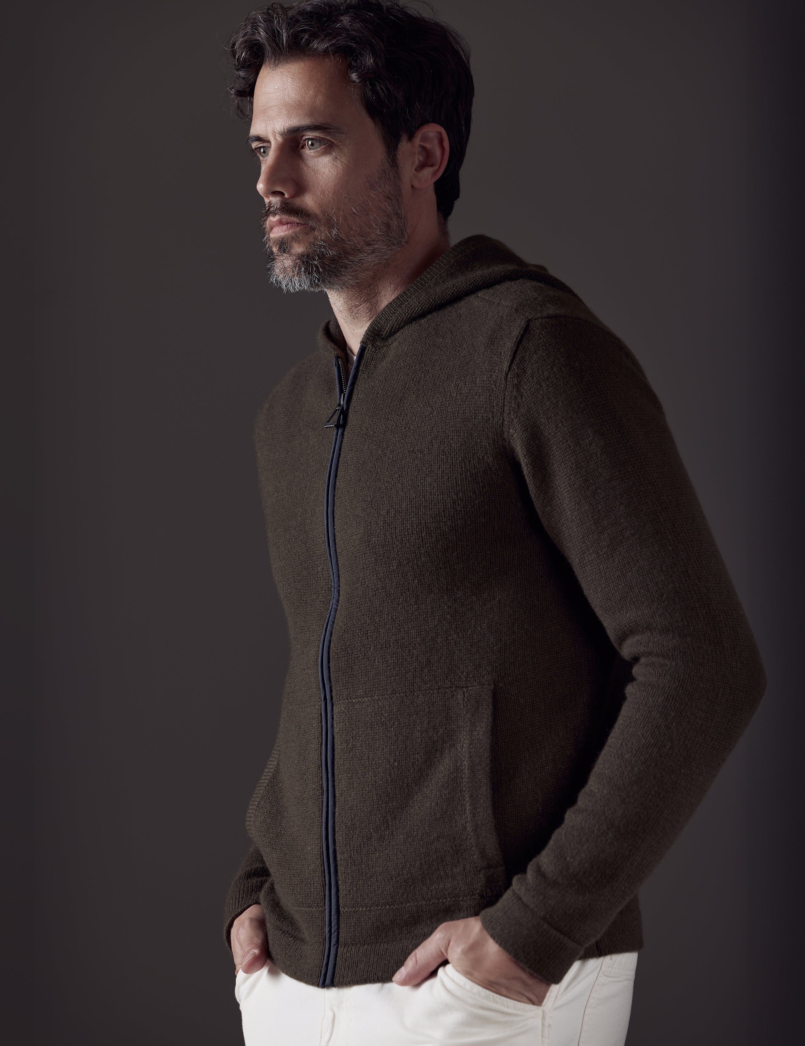 Front 3/4 body view of man wearing Sawyer Cashmere Full-Zip in Command Green from AETHER Apparel.