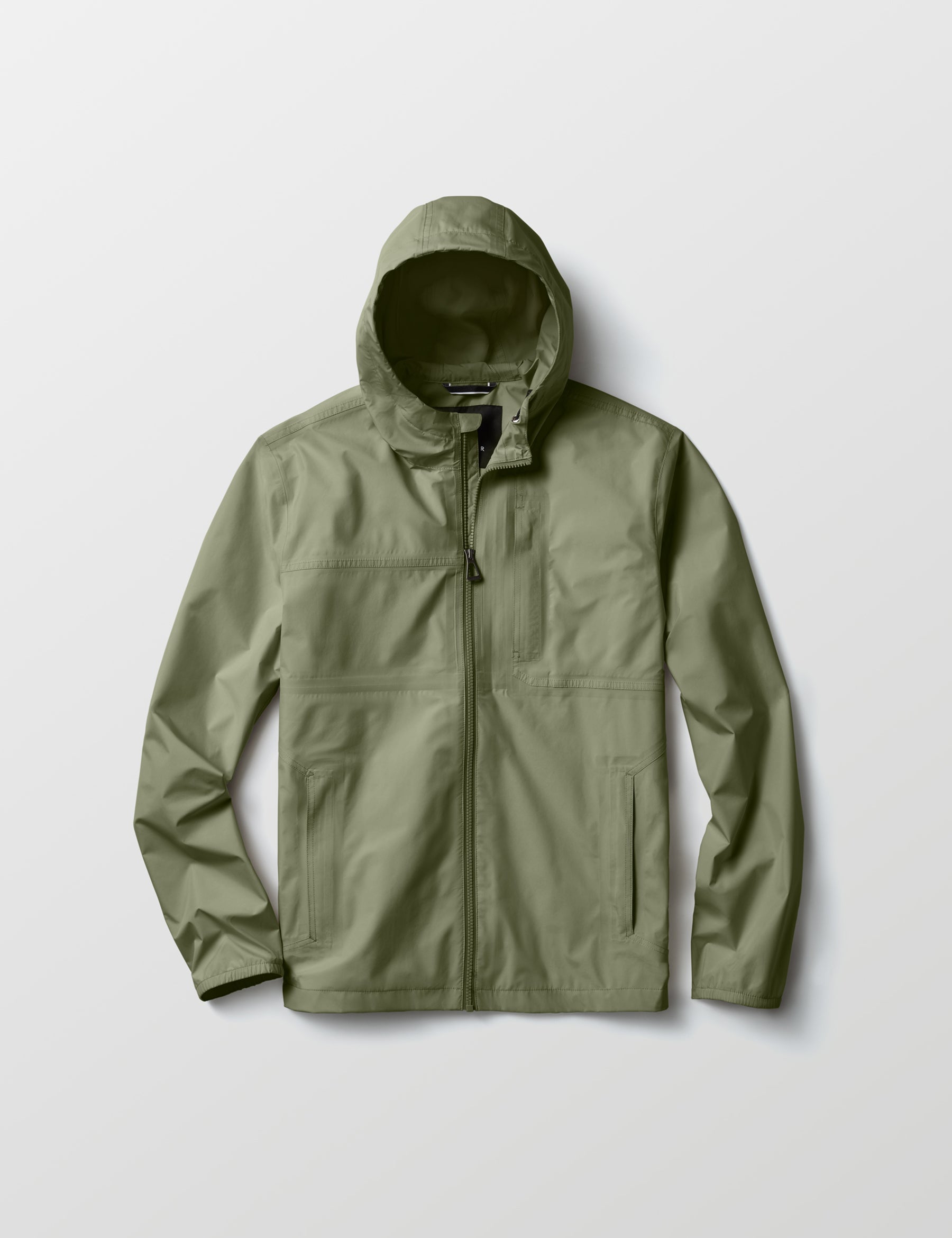 Flat lay view of Storm All-Weather Jacket in Fern Green from AETHER Apparel.
