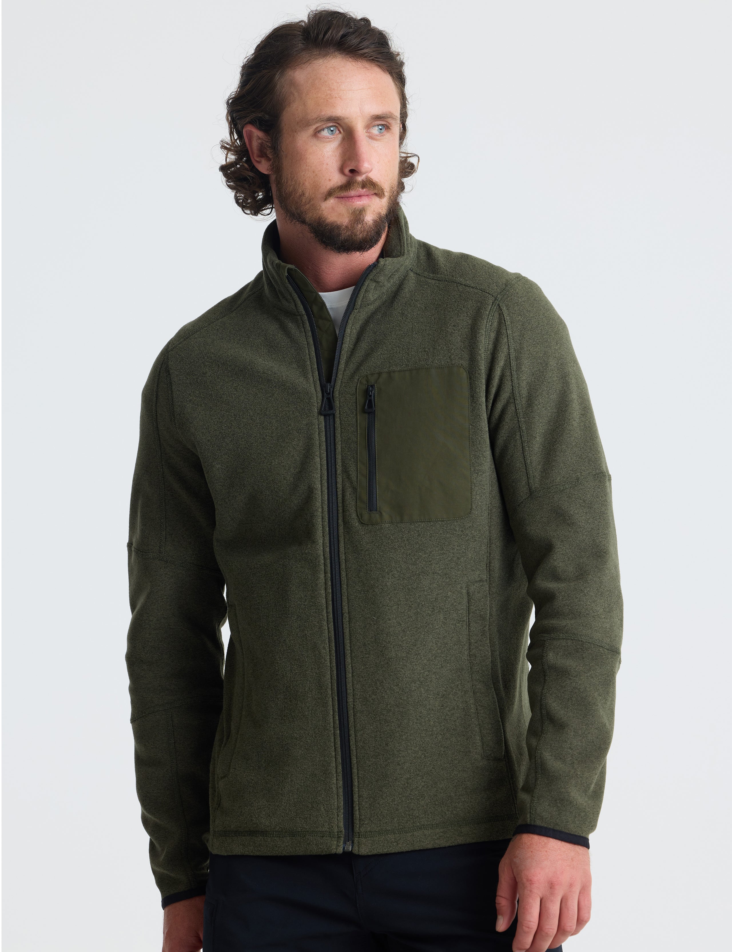 Front view of man wearing Sutherlin Full-Zip in Forest Green from AETHER Apparel.