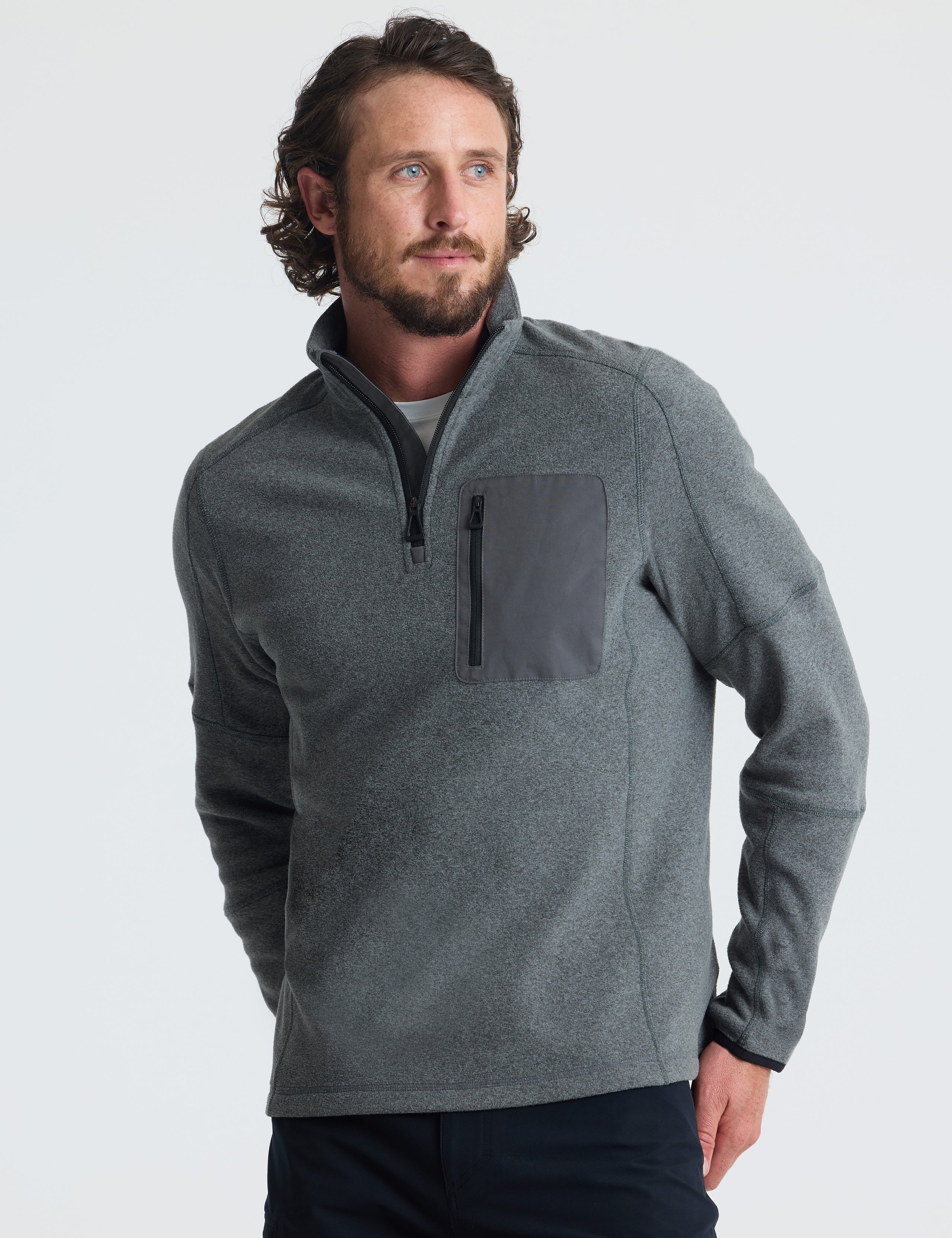 Front view of man wearing Sutherlin Half-Zip in Charcoal Heather from AETHER Apparel.