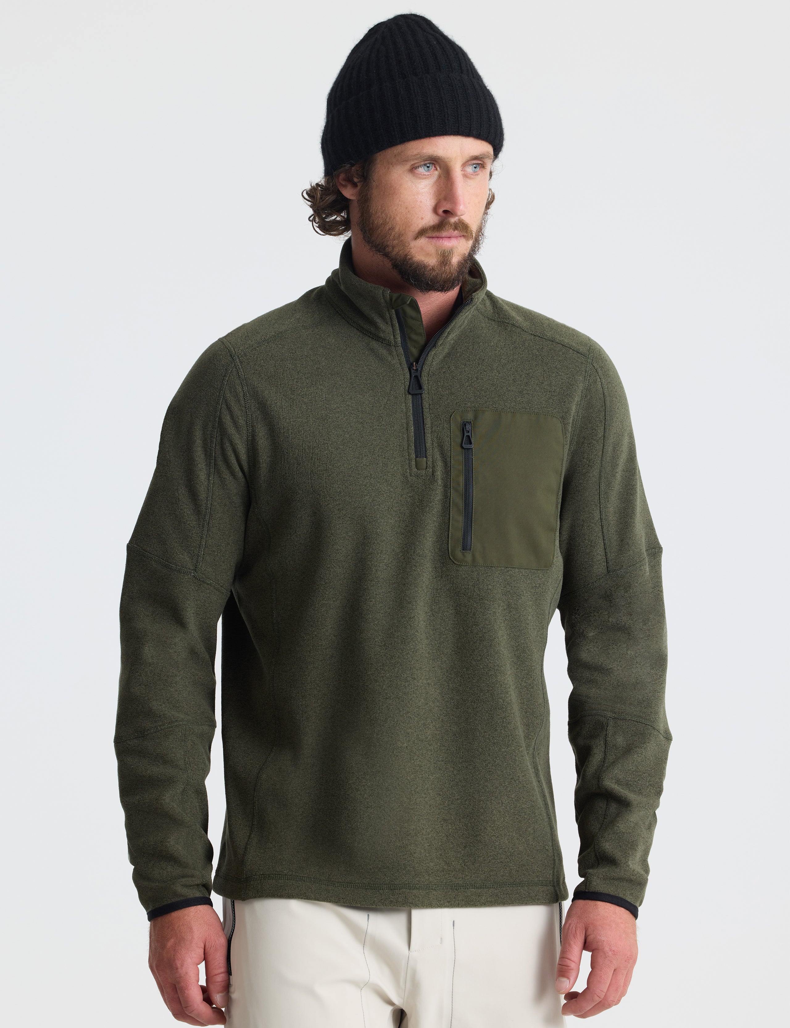 Front view of man wearing Sutherlin Half-Zip in Forest Green from AETHER Apparel.